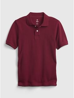 Made with 100% organically grown cotton.  Organic cotton is better for people and the environment because it's grown without the use of harmful synthetic pesticides and fertilizers.  Soft woven knit uniform polo shirt.  Spread collar, buttons at front.  Short sleeves.  #763889 Straight, easy fit.  Hits at the hip. Classic Solid Polo Shirt For School, Classic Polo Shirt For School, Classic School Polo Shirt, Classic Polo Shirt With Polo Collar For School, Fitted Short Sleeve Polo Shirt For School, Classic Cotton Polo Shirt For School, Classic Short Sleeve Polo Shirt For School, School Collared Polo Shirt, Basic Solid Color Polo Shirt For School