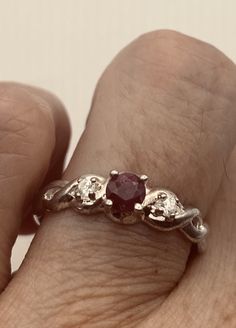 Unusual deep toned ruby sterling filigree setting handmade  size 8 Can be resized. My jeweler charges a $20 fee All rings are shipped in a nice gift box.   Check out our over a THOUSAND great reviews Engraving is $4 per letter and is not always perfect depending on the piece. It can take a few days if the jeweler is busy. This is payable to Paypal Judithsltd@gmail.com Silver Ruby Ring With Prong Setting As Gift, Silver Ruby Ring With Accent Stones As A Gift, Silver Ruby Ring With Accent Stones For Gift, Unique Silver Ruby Ring With Birthstone, Unique Silver Ruby Birthstone Ring, Heirloom Style Lab-created Ruby Ring As A Gift, Heirloom Style Lab-created Ruby Ring Gift, Ruby Rings With Intricate Design For Promise, Unique Ruby Promise Ring With Accent Stones