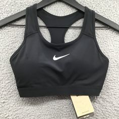 Nike Dri-Fit Racer Back Sports Bra Black S New With Tag. Excellent Condition. No Visible Flaws. The Removable 1-Piece Pad Is Designed To Resist Shifting Or Folding For A Reliably Comfortable Fit. The Pad Pocket Opens From The Top And Can Fit A Phone. Medium Support Machine Wash Polyester, Spandex, Elastane, Nylon Offers Welcomed Everyday, Loungewear, Casual, Undergarment, Yoga, Sporty, Active, Beach, Summer Black Sports Bra With Built-in Padding, Nike Sports Bra With Built-in Padding, Nike Sports Bra With Go-dry Technology, Nike Athletic Fit Sports Bra With Go-dry Technology, Nike Athletic Fit Sports Bra With Go-dry, Nike Activewear With Built-in Padding For Sports, Nike Go-dry Athletic Fit Sports Bra, Nike Sports Bra With Medium Support And Built-in Padding, Nike Stretch Sports Bra, Sweat Resistant