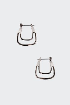 These equestrian-inspired earrings will add a classy touch to your look. Please avoid contact with liquids and creams when wearing your gold-plated jewelry. Keeping your plated jewelry as dry as possible will extend the life of its color and luster.- Stainless Steel Post- Approximately 7/8" long and 3/4" wide.- Brass plated in 14k Gold or Polished Pewter- Made in Los Angeles | Horse Shoe Earrings for Women in Gold Shoe Earrings, Los Angeles Apparel, Woman In Gold, Horse Shoe, Steel Post, Accessories Jewelry Earrings, Plated Jewelry, Women Accessories Jewelry, Gold Plated Jewelry