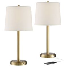 two lamps with one light turned on and the other turned off, sitting next to each other