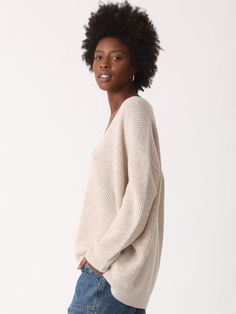 Our favorite slouchy cardigan in a luxuriously soft cashmere blend. The Everyday Cardigan features an oversized fit making it perfect for layering. You'll never want to take this one off. Fabric: 90% Wool, 10% Cashmere. Color-way: Oatmeal Heather. Model is 5'9" and wearing size small. Dry Clean Only. Beige V-neck Sweater For Fall Layering, Beige V-neck Sweater For Fall Loungewear, Oversized Neutral V-neck Sweater, Cream Soft Knit V-neck Sweater For Fall, Oversized Fine Knit Beige Sweater, Cozy Soft Knit V-neck Sweater For Layering, Relaxed Knit Sweater For Fall, Oversized Cozy V-neck Sweater For Loungewear, Oversized Neutral Sweater For Fall