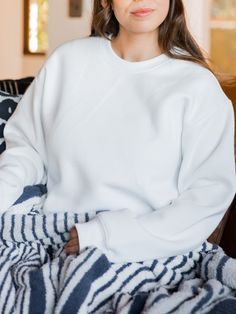 Made with the softest materials, this sweatshirt is designed to keep you warm and comfortable all season long. Whether you are lounging at home or running errands, this sweatshirt will be your go-to choice. Sizing: Small 4-6 Medium 8-10 Large 12-14 XL 14-16 Super Soft Cozy Cotton Sweats, Cozy Super Soft Cotton Sweats, Comfortable Winter Lounging Sweater, Snug Sweater With Ribbed Cuffs For Loungewear, Super Soft Long Sleeve Sweater, Super Soft Long Sleeve Sweater For Everyday, Snug Solid Sweater For Loungewear, Super Soft Cotton Sweats For Fall, Everyday Super Soft Long Sleeve Sweater