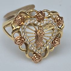 Solid Real genuine 14k Yellow Gold Beautiful 2 tone 14k yellow and rose gold heart and flower saint jude ring . Looks much better in person. Piece of art,  just lovely. excellent quality , brilliance and design It is hallmarked 14k inside the ring for authenticity See pics for detail and size, it appears bigger in pictures. made in italy Approximate measurments weight: 3.3 grams Width: 0.70x0.75 inch Size: 7 /sizable message me your ring size before or same time as checkout, free sizing up/ down to two sizes Order with confidence, we have earned top rated and 100% positive feedback for our excellent jewelry and services. Your satisfaction is my priority. Returns are accepted within 30 Days in original condition for any reason.in original condition, Free and fast shipping Free gift box Free Gold Rings Mexican, Virgin Mary Jewelry, Latina Rings, 15 Rings Quinceanera, Quince Rings, Sweet 16 Rings, Custom Gold Jewelry, Quince Themes, Quinceanera Jewelry