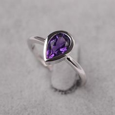 ~~~~~~~~~~~~~~~~Ring details~~~~~~~~~~~~~~~~metal: silver/14k white(rose/yellow) goldcenter stone:  Pear shape 6*9mm (1.33ct) amethystaccent stone: NoneNOTE: if it is silver or white gold, it will be get plated with rhodium~~~~~~~~~~~~~~~~Customization is available~~~~~~~~~~~~~~~~you can change, add or remove any parts of the ring if you have good idea. I can add special engraving inside the shank of the ring by free (words, date, simply simbles and so on) too. I am happy to help out or make any Teardrop Amethyst Ring For Anniversary, Elegant Teardrop Amethyst Ring, Pear-shaped Purple Amethyst Ring With Prong Setting, Elegant Pear-shaped Amethyst Promise Ring, Purple Teardrop Amethyst Ring For Anniversary, Purple Pear-shaped Amethyst Ring With Prong Setting, Elegant Teardrop Amethyst Gemstone Ring, Fine Jewelry Teardrop Purple Ring, Fine Jewelry Purple Teardrop Ring