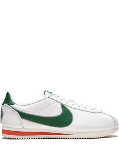 white/forest green/red leather front lace-up fastening branded heel counter signature Swoosh logo detail logo patch at the tongue round toe flat rubber sole When buying this unisex item, keep in mind that it is graded in standard men's sizing. These styles are supplied by a premium and authenticated sneaker marketplace. Stocking only the most sought-after footwear, they source and curate some of the most hard to find sneakers from around the world. Hawkins High School, Cortez Sneakers, Cortez Shoes, School Sneakers, Nike Force 1, Nike T, Shoe Nike, Men's Shoe, Black Friday Promotions