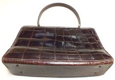 © AP6.0 Vintage Triumphe Women's Handbag/Purse 50s Made in France for Bamberger's/MACYs Up for auction is a rare find: Triumphe handbag/purse made in the 50s in France exclusively for Bamberger's NJ (which later became MACYs) . It measures approx. 10.5" x 6.5" x 3". The purse is used very slightly (see pictures),and still has a lot of life in it. Sold on as is basis. Great buy! Rare find! No reserve!     PLEASE READ THE FOLLOWING ATTENTIVELY BEFORE BIDDING   Successful buyer agrees to pay $13.50 Vintage Brown Antique Bag For Formal Occasions, Antique Brown Bags For Formal Occasions, Antique Vintage Brown Formal Bag, Vintage Brown Formal Bag, Antique Style Vintage Brown Formal Bag, Antique Satchel For Formal Occasions, Antique Formal Satchel Bag, Antique Style Formal Satchel Bag, Formal Vintage Brown Shoulder Bag