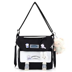 PRICES MAY VARY. 【HIGH QUALITY MATERIAL】 The kawaii shoulder bag is made of high-quality nylon fabric, which is wear-resistant and good in texture, durable to use. 【LARGE CAPACITY】 Size:12.6x11x4.3in. The storage space of this kawaii messenger bag is big enough for your daily belongings. You can easily take your iPad, cell phone, book, wallet, makeup, etc. with you. 【KAWAII ACCESSORIES】Comes with kawaii pins and stuffed pendant. You can also DIY the cute crossbody bag with other kawaii accessori Back To School Portable Satchel Shoulder Bag, Portable Crossbody Canvas Bag For School, Trendy Square Shoulder Bag For School, Harajuku Style Large Capacity White Shoulder Bag, White Harajuku Shoulder Bag With Large Capacity, White Harajuku Style Shoulder Bag With Large Capacity, Rectangular Large Capacity Chest Bag For School, Harajuku Style White Bag For Travel, Trendy School Shoulder Chest Bag