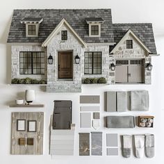 an assortment of house materials displayed on a white surface with the top half painted gray