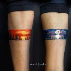 two people with tattoos on their legs, one has a sunset and the other is trees