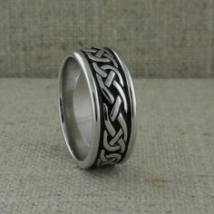 Sterling Silver Celtic Knot Wedding Ring with Black Enamel — Unique Celtic Wedding Rings Black Enamel Ring For Wedding, Black Elegant Engraved Promise Ring, Black Promise Ring With Polished Finish, White Gold Rings With Black Enamel For Wedding, White Gold Jewelry With Black Enamel For Wedding, White Gold Wedding Jewelry With Black Enamel, Classic Black Band Jewelry For Formal Events, Black Enamel Round Jewelry For Weddings, Silver Rings With Black Enamel For Wedding