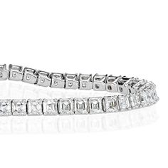 This 14k white gold asscher cut tennis bracelet design is incredibly chic with amazing sparkle. Each diamond is handset with meticulous detail so that the straight-edged features renown of the asscher cuts line up perfectly. This beauty is set with 6.34ct of perfectly eye clean and colorless asscher cut diamonds. The luxurious sleekness of this 6.5' long bracelet is sure to attract the eyes of many! Luxury Diamond White Tennis Bracelet With Diamond Cut, Luxury Emerald Cut Diamond Tennis Bracelet, Formal Emerald Cut Diamond Bracelet With Single Cut Diamonds, Rectangular Diamond Cut Tennis Bracelet, Formal Emerald Cut Platinum Diamond Bracelet, Elegant Octagon Diamond Bracelet, Formal Emerald Cut Diamond Platinum Bracelet, Classic Brilliant Cut Diamond Bracelet, Formal Octagon Diamond Bracelet