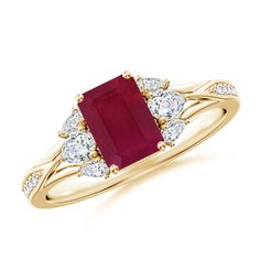 an oval cut ruby and diamond ring