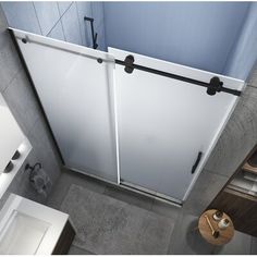 an overhead view of a bathroom with a shower and toilet