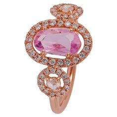 Pink Sapphire surrounded by brilliant round cut Diamond Ring 1 Uneven shape Sapphire 0.83 CTS Both side 2 Rose cut Diamonds 0.07 CTS 47 Round brilliant cut diamonds 0.34 CTS 18 k Rose gold mounting 2.08 GMS Custom Services Resizing is available. Request Customization Round Cut Diamond Ring, Brilliant Cut Diamond Ring, Cute Rings, Three Stone Rings, Rose Cut Diamond, Round Brilliant Cut Diamond, Three Stone, Round Cut Diamond, Brilliant Cut Diamond