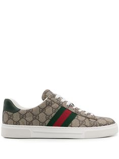 beige panelled design GG Supreme canvas signature Web detailing contrasting branded heel counter round toe front lace-up fastening branded leather insole flat rubber sole This piece comes complete with a protective dust bag. Women's Gucci sneakers fit large. For the most comfortable fit please select half a size down. Gucci Luxury Sneakers With Contrast Sole, Designer Beige Sneakers With Rubber Sole, Designer Low-top Cream Sneakers, Designer Cream Low-top Sneakers, Designer Gucci Sneakers With Textured Sole, Designer Beige Sneakers With Contrast Sole, Gucci Sneakers With Textured Sole And Round Toe, Designer Cream Lace-up Sneakers, Gucci Low-top Sneakers With Perforated Toe Box