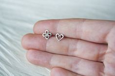 This is a mismatched pair of tiny stud earrings - you are getting one tiny heart and one four leaf clover (Celtic knot) shape. Studs are hand fabricated by me from solid sterling silver. I believe these popular symbols in a pair will make a great gift for someone special :) ● Earrings will be shipped with sterling silver backs ● Heart shape measures approx 6 x 7.5 mm ● Clover (Celtic knot) measures approx 7 x 7 mm If you prefer *matched* earrings: ► Pair of heart studs: http://www.etsy.com/listi Dainty Heart Earrings As A Gift, Dainty Sterling Silver Heart Earrings For Pierced Ears, Delicate Sterling Silver Heart Earrings Gift, Delicate Sterling Silver Heart Earrings For Pierced Ears, Delicate Sterling Silver Heart Earrings, Cute Sterling Silver Heart Earrings For Gift, Handmade Dainty Sterling Silver Heart Earrings, Personalized Sterling Silver Heart Earrings As Gift, Dainty Sterling Silver Heart Earrings As Gift