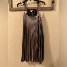 Shiny Metallic Spaghetti Strapped, Pleaded Dress Cute For Going Out And Dancing Or For The Holidays Medium Gray Spaghetti Strap Dresses For Spring, Gray Spaghetti Strap Spring Dress, White Sheer Dress, Cold Shoulder Shift Dress, Long Sleeve Tunic Dress, Ruffle Midi Dress, Short Sleeve Dress Shirt, Sleeveless Dress Summer, Midi Sheath Dress