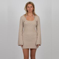 Nwt Rusty Brand Beige Knit Mini Dress For Parties, Beige Knit Bodycon Mini Dress, Long Sleeve Sweater Dress For Spring Beach Days, Long Sleeve Sweater Dress For Beach In Spring, Beige Mini Sweater Dress For Spring, Fitted Pointelle Knit Sweater Dress In Mini Length, Beige Crochet Mini Dress For Party, Beige Knit Mini Dress For Spring, Spring Beige Knit Mini Dress