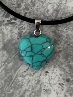 Teal turquoise stone heart pendant rope necklace.  Add a touch of elegance to your wardrobe with this beautiful necklace. Handmade with love to elevate any look.  The black rope is 20 inch in length and fastens with a lobster clasp. lovely stone heart dangle pendant. Free shipping to UK buyers. dispatched within 1-3 days but I aim to post the next day.  Presented on a gift card and wrapped beautifully in luxury tissue paper and a blush pink organza bag so makes the perfect gift.  If you aren't completely in LOVE with your purchase, please let me know and you'll receive a stress free refund. Customer satisfaction is my number one priority.  These are perfect for any occasion and outfit. Thank you for viewing. Please ask any questions, I am always available to help.  Thank you for supporting Casual Heart Necklace With Heart Pendant, Casual Necklace With Heart Charm, Casual Heart Charm Necklace For Gift, Casual Heart Charm Necklace As Gift, Casual Heart Charm Necklace Gift, Casual Heart Pendant Necklace Gift, Trendy Turquoise Necklace For Gift, Casual Heart-shaped Necklace For Gift, Adjustable Turquoise Heart Pendant Jewelry