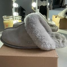 These Ugg Slippers Are Adorable And So Comfy. They Are A Soft Grey And Are A Great Addition If You Like Cozy Wear. Ugg Fluffita Slippers, Gray Uggs, Grey Ugg Slippers, Grey Uggs, Ugg Shoes Women, Grey Ugg, Cute Uggs, Ugg Scuffette, Cozy Wear