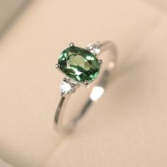 Green sapphire ring sterling silver engagement ring oval | Etsy Green Diamond Ring Silver, Green Oval Ring, Green Stone Ring Silver, Silver Rings With Green Stones, Blue Green Sapphire Engagement Ring White Gold, Green Saffire Engagement Ring, Green Diamond Ring Engagement, Sapphire Green Engagement Ring, Silver Green Engagement Ring