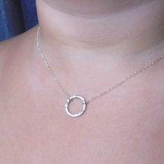 Beautiful circle karma necklace silver 925. This beautiful minimalist necklace made from silver 925, karma necklace is meant to attract good karma to you and those around you. The circle made from 1.5mm silver 925 which hammered on hand. The diameter of circle is 1.6cm The chain is also from silver 925. SIZE This beautiful necklace is available in 5 different sizes: 14inch 16.5inch, 17.5inch,  18.5inch, 19.5inch. Please contact with me if you prefer different size. Every item we sell is handmade Dainty Open Circle Necklace For Everyday, Minimalist Full Circle Necklace With Delicate Chain, Dainty Open Circle Everyday Necklace, Dainty Everyday Open Circle Necklace, Dainty Everyday Charm Necklaces With Open Circle, Dainty Open Circle Charm Necklaces For Everyday, Minimalist Open Circle Charm Necklace With Adjustable Chain, Simple Open Circle Necklace For Gifts, Simple Open Circle Necklace For Gift