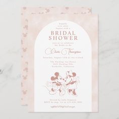 a pink and white wedding shower with minnie mouses on it's front cover