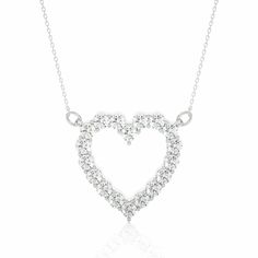 Buy this 0.50 Ct Diamond Heart Shaped Pendant as this pendant is creating a unique look with its special formation, the diamonds are placed in white gold metal. Shop this elegant beauty at the best price! Note:- Each pendant will come with its respective chain included. The cost of the chain is already included in the displayed total amount. Please note that the chain you receive may vary slightly from the one shown in the image. Diamond Heart Pendant Necklace For Wedding, Diamond White Heart Diamond Necklace For Wedding, White Gold Cubic Zirconia Heart Necklace For Wedding, Diamond White Heart Necklace With Diamond Accents For Wedding, Elegant White Heart Cut Necklace, White Heart Diamond Necklace For Formal Occasions, White Heart-shaped Diamond Necklace For Formal Occasions, White Heart-shaped Diamond Necklace For Formal Events, White Heart Pendant Necklace For Formal Occasions