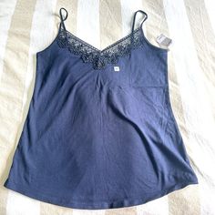 Loft Navy Blue Tank With Lace Size M Cotton In A New With Tags Condition Size M 95% Cotton, 5% Spandex Super Soft Material Armpit To Armpit: 16' Length From Shoulder Down: 24" Blue Cotton Cami Top, Casual Blue Camisole For Loungewear, Floral Cami, Crochet Halter Tops, Levi Jeans 501, Pink Tank, Distressed Black Jeans, Polo Dress, Navy Floral