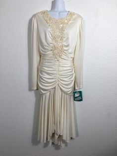 Cream Fitted Evening Dress For Prom, Cream Fitted Evening Dress For Prom Season, Fitted Cream Evening Dress For Prom, Fitted Cream Evening Dress For Prom Season, Elegant Dress For Vintage Events And Prom Season, Elegant Vintage White Party Dress, Elegant Vintage White Dress For Party, Elegant Cream Vintage Wedding Dress, Elegant Cream Vintage Dress For Wedding