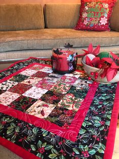 the table is decorated with red and green decorations