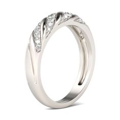 On your wedding day, seal your vows to her with this stylish wedding band. It features four diagonal channels, each set with shimmering round stones. A meaningful look of love, this wedding band will capture her heart. Each time she glances at this lovely band, her thoughts will turn to you. Carat Weight: 0.469 ctStone Size: 1,1.1,1.2,1.3,1.5 mmStone Type: Jeulia® StoneNumber of Stones: 26 Stone Color: Diamond WhiteStone Shape: RoundWeight: 4.56 gWidth: 4.5 mmHeight: 2.7 mmThickness: 2.6 mmMaterial: 925 SilverPlating Color: Silver Elegant Promise Ring With Channel Set Bands, Elegant Channel Set Promise Ring Bands, Elegant Diamond White Bridal Sets For Promise, Elegant Bridal Sets In Diamond White For Promise, Elegant White Promise Ring Bands, Elegant Moissanite Channel Set Eternity Band, Elegant White Gold Channel Set Bands, Elegant Channel Set White Gold Bands, Elegant Silver Bands For Marriage