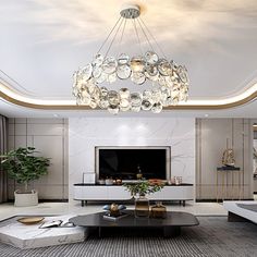 an elegant living room with modern furniture and chandelier hanging from the ceiling,