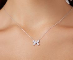 14K SOLID WHITE GOLD BUTTERFLY NECKLACE WITH DIAMONDS Metal : 14K Solid Gold Necklace Length : 16 inches / 40cm Butterfly Height : 10mm Butterfly Width : 10.75mm Diamond : 35 Diamonds --- Nice White Color Sparkle Diamonds ---- G-H color SI2 clarity Total Carat: 0.18ct ---MADE IN USA--- ---This is a beautiful 14K Solid White Gold Butterfly Necklace with Diamonds. Available White Gold -Yellow Gold or Rose Gold ---Absolutely stunning. Comes in a gift box. ---Shipping Policy---- Item will be shipped Fine Jewelry Butterfly Necklaces In White Gold, Formal White Gold Necklace With Butterfly Charm, Butterfly Shaped Fine Jewelry Necklace For Anniversary, Fine Jewelry Butterfly Necklace For Anniversary, White Diamond Necklace With Butterfly Charm, Formal White Gold Butterfly Necklace, White Diamond Butterfly Necklace For Gift, White Diamond Butterfly Necklace As Gift, White Butterfly Necklace In Fine Jewelry Style