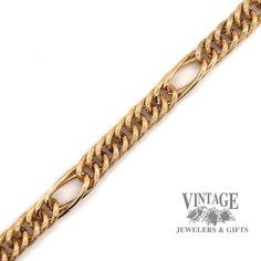 14 karat yellow gold 7.5" hollow link bracelet. The textured finish on the links of this bracelet add to it's charm. Coupled with the bright finish elongated and slightly twisted double link connecting sections, this estate bracelet has style not recently seen in current designs. Yellow Gold Curb Chain Bracelet With Rectangular Links, Formal Figaro Chain Link Bracelet, Gold Oval Link Figaro Chain Bracelet, Gold Figaro Chain Bracelet With Oval Links, Formal Figaro Chain Bracelet With Oval Link, 14k Gold Oval Link Curb Chain Bracelet, Formal Gold Figaro Chain Bracelet, Classic Wheat Chain Link Bracelets, Gold Cuban Link Bracelet With Oval Links