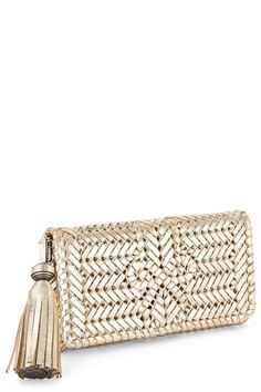 Anya Hindmarch neeson tassel clutch in platino. Features: Removable Wristlet Strap 100% Goat Leather Length: 23.5' Height: 12.5' Depth: 4' Made in China Anya Hindmarch, Goat Leather, Made In China, Plastic Canvas, Tassels, China, Canvas, Leather