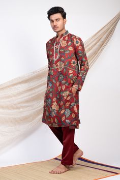 Maroon full sleeves kurta with all over Noor Gul kalamkari print and zardozi highlights on the placket. Paired with a self color pant. - Aza Fashions Multicolor Cotton Unstitched Suit With Long Sleeves, Multicolor Long Sleeve Unstitched Suit With Dabka, Multicolor Long Sleeve Unstitched Suit For Eid, Cotton Long Sleeve Bandhgala For Diwali, Unstitched Kalamkari Print Salwar Kameez With Long Sleeves, Salwar Kameez With Kalamkari Print For Transitional Season, Cotton Bandhgala With Zari Work And Long Sleeves, Cotton Long Sleeve Bandhgala With Zari Work, Long Sleeve Cotton Sherwani With Dabka