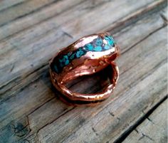 * Molten Copper Ring. * 2 X 8mm Irregular Wide. Other Wide will be done by the Special Order. Please Contact. * Polished and Waxed. Ceramic Coate (CeraKote) will be done by the request on the option. * Turquoise inlay. For the black, leave it on the note. * 8mm Wide. * Mark your ring size on the option. Artisan Handmade Turquoise Wedding Ring, Artisan Handmade Turquoise Ring For Wedding, Artisan Patina Rings For Anniversary, Turquoise Hand Forged Artisan Rings, Ring Turquoise, Copper Cuff, Copper Ring, Copper Rings, Turquoise Rings