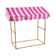 a pink and white striped awning on top of a metal stand with gold legs