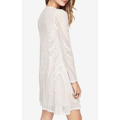 Our must-have long-sleeve dress in geometric lace falls for a semi-relaxed fit and has some stretch for all-day ease. Its semi-sheer effect is pared down with its jersey lining through the body.PulloverGeometric patchwork laceFabric: 95% nylon, 5% spandex lace; lining: 92% polyester, 8% spandex jerseyWashable, dry clean recommendedMid-weight, stretch fabricKnee-length hemlineTrue to fitModel is approximately 5'9” Summer Scalloped Lace Long Sleeve Dress, Summer Long Sleeve Lace Dress With Scalloped Lace, Summer Lace Dress With Scalloped Lace And Long Sleeves, Spring Crochet Dress With Long Lace Sleeves, Spring Long Sleeve Crochet Lace Dress, Spring Long Sleeve Lace Crochet Dress, Elegant Long Sleeve Crochet Dress For Spring, Long Sleeve Scalloped Lace Dress, Long Sleeve Crochet Dress With Lace Trim For Parties