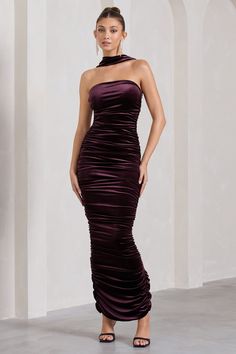 Spice things up this season in our aptly-named maxi Cayenne﻿. Perfect for your next race day or dinner date. this figure sculpting dress was designed in a soft premium purple velvet which guarantees the ultimate blend of comfort and confidence.Features - Premium stretch velvet - Bodycon fit - Fully ruched - Halter neckline - Open-back - Split hemline - Invisible zip closure - Maxi lengthSizing & fit Model is 5'7" and wears UK size 8 / US size 4Product information Designed exclusively by Club L L Purple Ruched Maxi Dress For Evening, Elegant Purple Strapless Dress For Date Night, Strapless Purple Maxi Dress For Party, Purple Velvet Dress For Party, Purple Velvet Party Dress, Purple Strapless Maxi Dress For Prom, Figure Sculpting, Bandeau Maxi Dress, Ankle Length Dress