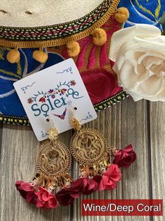 These Beautiful Mexican Earrings are made with the Mexican art form of twisting gold plated wires to create beautifully intricate works of art. The silk flowers add that feminine touch to any outfit! These earrings are handmade by Mexican Artisans. More colors available here: https://www.etsy.com/es/listing/887054053/aretes-mexicanos-de-filigrana-aretes?ref=listing_published_alert Gold Drop Flower Earrings For Festive Occasions, Gold Flower Earrings For Festive Occasions, Festival Dangle Flower Earrings As Gift, Festival Gift Dangle Flower Earrings, Elegant Dangle Flower Earrings For Festivals, Traditional Gold Flower Earrings With Ear Wire, Gold Flower Drop Earrings For Festival, Gold Flower Earrings For Festival, Elegant Gold Flower Earrings For Festivals