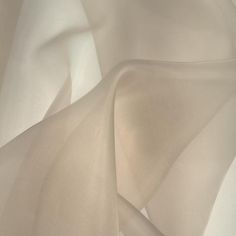 PLEASE NOTE: This silk is available by special order only and is not eligible for any discounts. Additionally, the color swatch comes in silk charmeuse as it is for color purposes only. Please allow an additional 1-2 business days for processing. Solid Silk Organza Color - Sand Content - 100% Silk Width - 42/44" Fabric Care - Dry Clean Only Reorderable Note: Product image does not reflect the top quality of our organza fabric, and is simply to provide a sense of the color. Therefore, we highly r Elegant Cream Sheer Tulle Fabric, Fabric Photography, Black Color Hairstyles, Color Hairstyles, Fashion Forecasting, Organza Fabric, Silk Brocade, Silk Organza, Silk Charmeuse