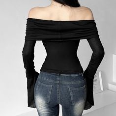 Elevate your look with our Off The Shoulder Long Sleeve Top. Featuring a chic bardot style and dramatic long flare sleeves, this top is crafted from a blend of polyester and spandex for a slim fit and crop length that flatters your silhouette. Make a bold statement with this sophisticated and exclusive piece, perfect for any occasion. Off-the-shoulder bardot style Dramatic long flare sleeves Slim fit for a flattering silhouette Crop length for a bold look Crafted from polyester and spandex blend Fitted Long Sleeve Off-shoulder Top For Fall, Fall Long Sleeve Fitted Off-shoulder Top, Non-stretch Cropped Top For Night Out, Chic Fitted Long Sleeve Off-shoulder Top, Trendy Stretch Off-shoulder Long Sleeve Top, Trendy Stretch Off-shoulder Top With Long Sleeves, Fitted Black Long Sleeve Off-shoulder Top, Black Stretch Off-shoulder Top In Elastane, Black Stretch Elastane Off-shoulder Top