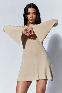 Soft and dreamy – with shades of Boho-beach babe – ZAHRA is casual elegance wrapped in comfy cotton blend and long, fluted sleeves. A closed, straight-cut neckline lengthens your torso and accentuates the shape of your shoulders. MESHKI’s custom blend of cotton, acrylic, and nylon fabric keeps you feeling comfortably cool whilst perfectly framing your figure. The raw hem skirt that falls well above the knees paired with long fluted sleeves creates an airy, romantic silhouette. Zahra is a definit Y2k Long Sleeve, Sweater Dress Casual, Flare Long Sleeve, Sleeves Clothing, Mini Sweater Dress, Casual Sweaters, Chic Woman, Sweater And Shorts, Womens Fall