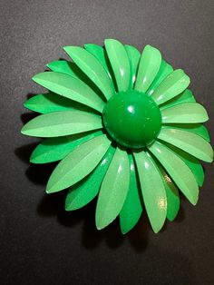 Sold as is. Beautiful collectors brooch from the 70s. Quality made. Metal. Priced to sell Seashell Earrings, Green Metal, Movies Outfit, Vintage Mirror, Shop Small Business, Barbie Movies, The 70s, Porcelain Dolls, Rhinestone Earrings