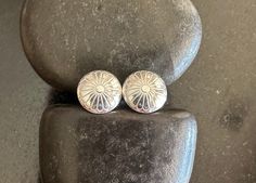 These modern mini conchos are .925 solid sterling silver and are slightly domed. These stud earrings are lightweight and an easy pair of go-to studs that will go with everything. These conchos measure 11mm and are finished with medium weight sterling silver butterfly backs. Because they are slightly domed, I make longer posts and solder at the center of the backside.  After soldering, earrings are oxidized (at your request) or left shiny and tumbled for strength and shine. Images shown are shiny. These are so cute.  The photos are enlarged to show all the details.    ~~ All jewelry from The Black Lotus Jewelry Co. will arrive securely packaged in a gift box with a lovely ribbon. Perfect for gift giving or a wonderful treat for yourself! Thank you for supporting my little shop and handmade. Elegant Concho Earrings For Gift, Silver Concho Earrings As A Gift, Silver Concho Earrings For Gift, Decorative Silver Earrings As Gift, Elegant Silver Concho Earrings, Adjustable Southwestern Round Earrings, Silver Southwestern Round Earrings, Concho Earrings, Dome Earrings