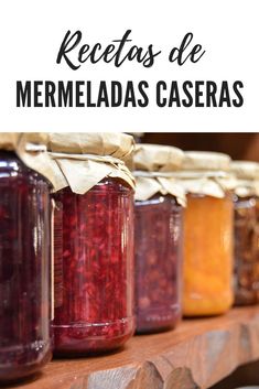 jars filled with food sitting on top of a wooden shelf next to text overlay that reads use dry pack canning method to preserve food