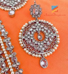 Silver Polki and Stones Long Rani Haar Necklace Earrings Tikka Set Available to be shipped for FREE from Canada to USA, Europe, Italy, Norway and everywhere else. Explore more PUNJABI BRIDAL JEWELLERY SETS 👉 PUNJABI BRIDAL JEWELLERY ONLINE 🛒 INDIAN BRIDAL JEWELLERY 📦Unmatched FREE Worldwide Shipping Sukhpal, Canada ⭐️⭐️⭐️⭐️⭐️ Hello Kiran Our order arrived today and we absolutely love every piece. Everything is so beautiful. My daughter loves her nose ring. We can’t wait to shop with you more Jewelry With Matching Round Pendant Earrings For Wedding, Matching Earrings With Round Pendant For Wedding, Silver Costume Jewelry Earrings For Celebration, Wedding Costume Jewelry For Pierced Ears, Bridal Necklace With Matching Earrings, Silver Costume Jewelry Sets For Festivals, Bridal Silver Necklace With Matching Earrings For Festivals, Silver Bridal Necklace With Matching Earrings For Festivals, Silver Chandbali Jewelry Sets For Gift